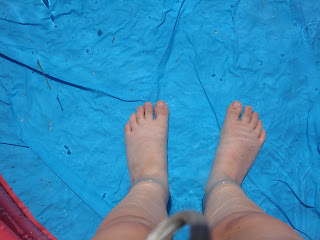Top Enders feet in the padling pool
