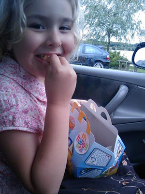 Top Ender eating a McDonalds Happy Meal in the car