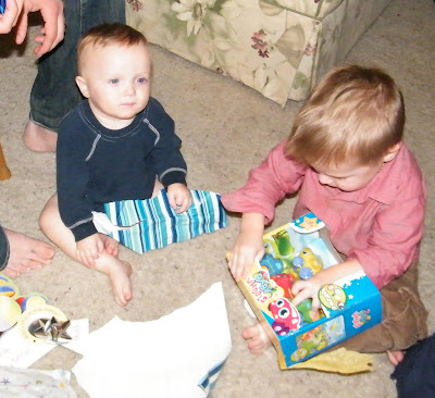 baby opening presents