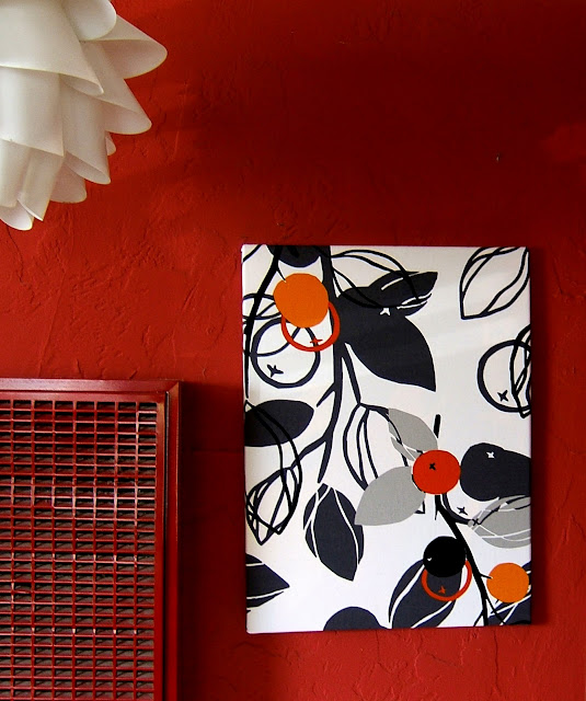 Step 2 Lay out your fabric face down, and put the canvas on. Play