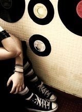 [sitting-emo-girl-beside-wall.jpg]