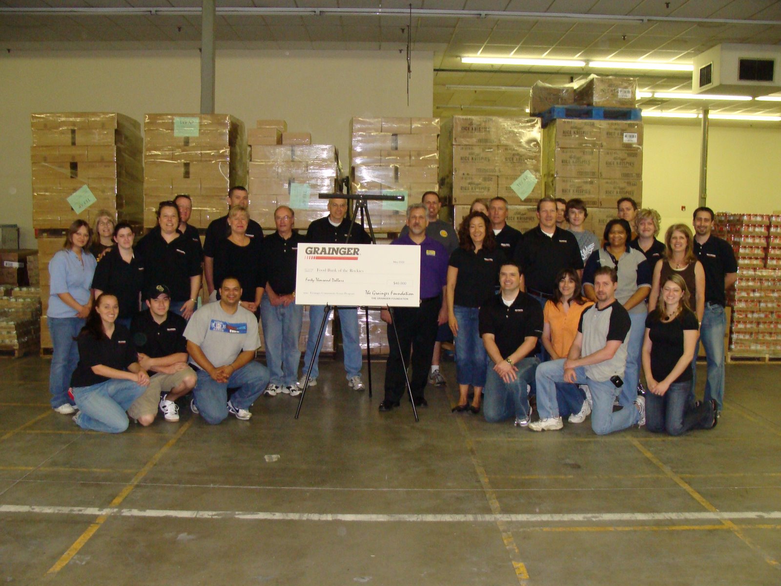 [volunteer+shot+with+check.JPG]