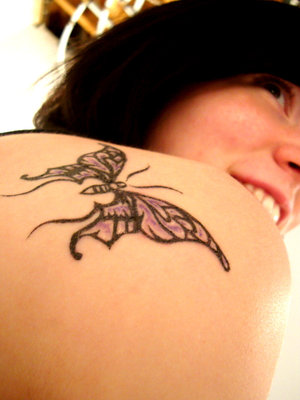 Women Upper Back Dragonfly Tattoo