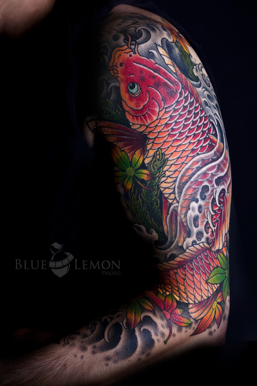 Koi fish sleeve tattoos design is excellent tattoo for mens