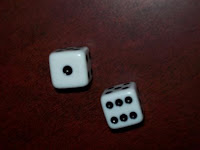 Photo of two dice with the sum of 7