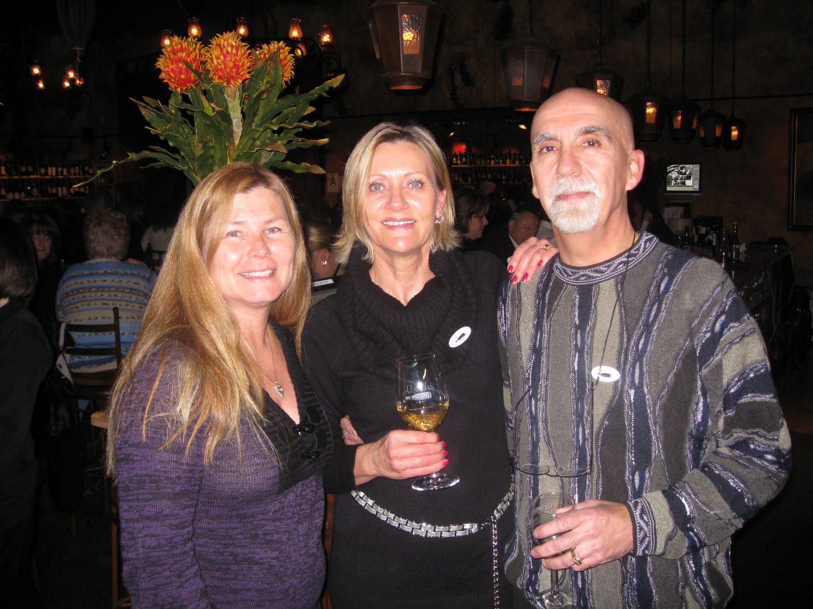 [trio+in+front+room+Haiti.JPG]