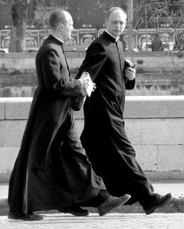 [427px-Priests_rome.jpg]