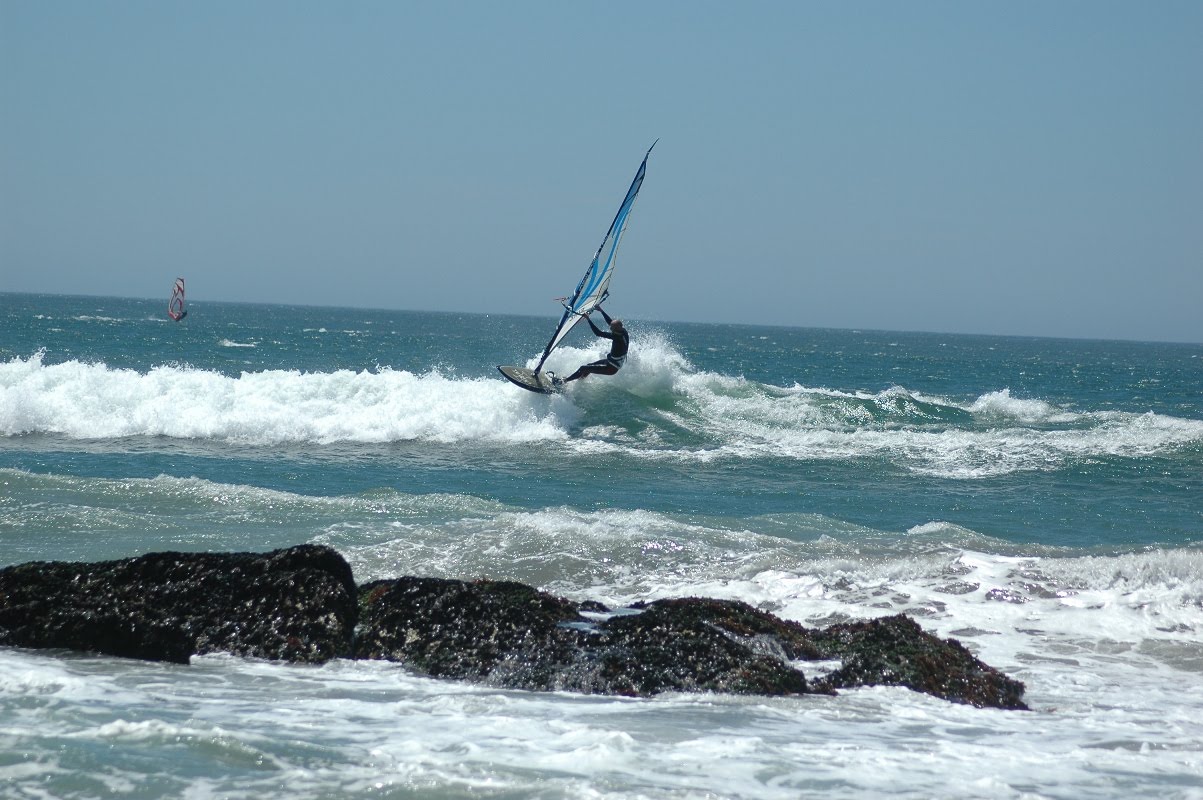 Hot Trips Fun surfing with a sail