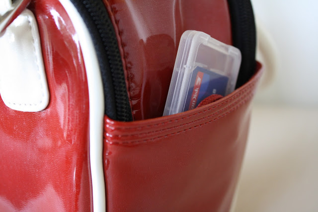 Close up of bag pocket with a memory card in it.