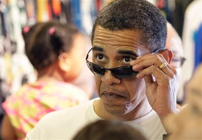 obama+looking+over+glasses.jpg