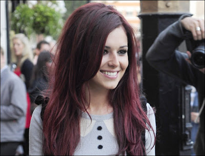 She has of course, dyed her hair red! Cheryl Cole and red hair would never