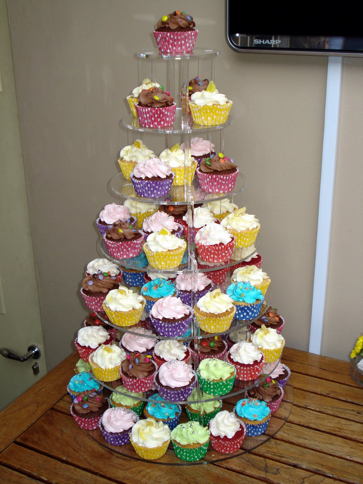 Custom Cake Design All The Colours of The Rainbow Cupcake Tower