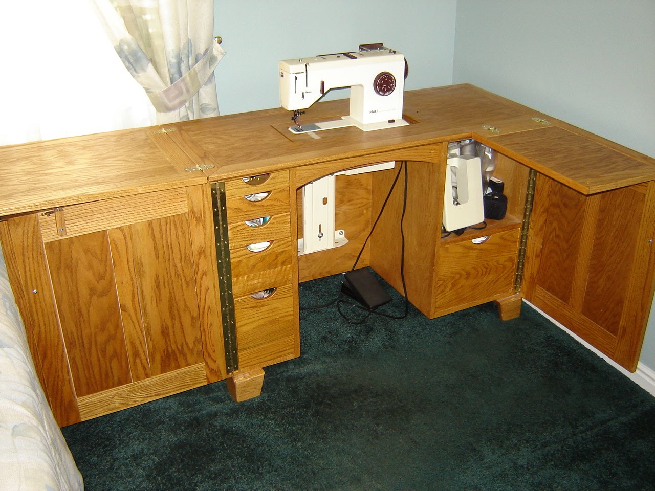 The Woodmaster: Sewing Cabinet - with power lift