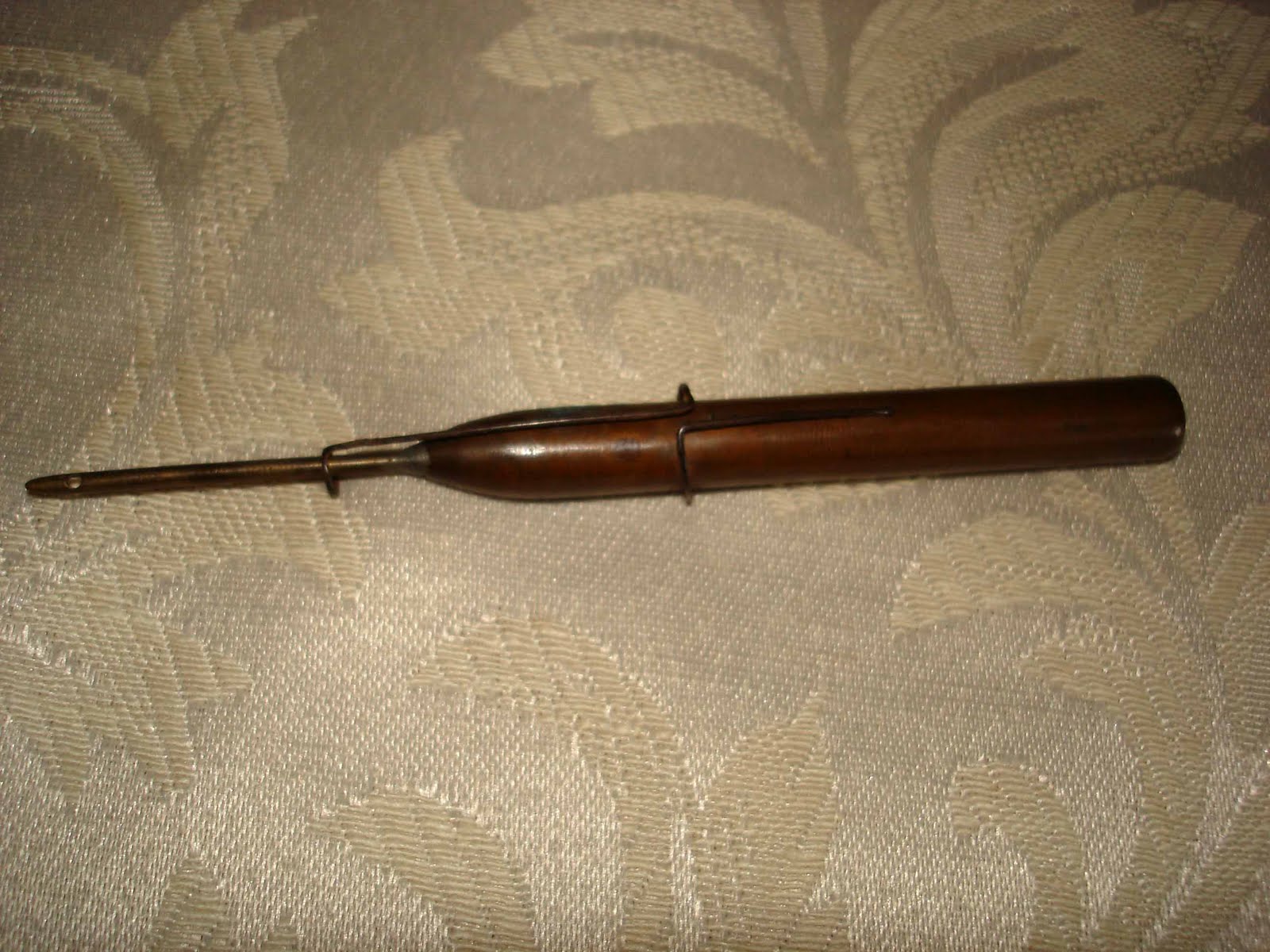 [agulha+apanha+malhas+antiga.jpg]