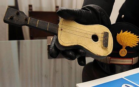 [little+toy+guitar+made+by+picasso.jpg]