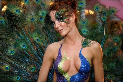 Beautiful Girl With Body Paint Art And Feathers Bird Background