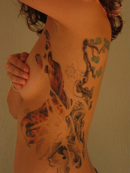 [japanese-koi-ribcage-tattoo.jpg]
