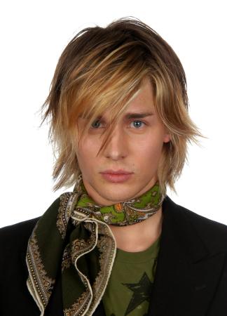 2005 men long hairstyle. Brunette hair was cut into mid length layers and