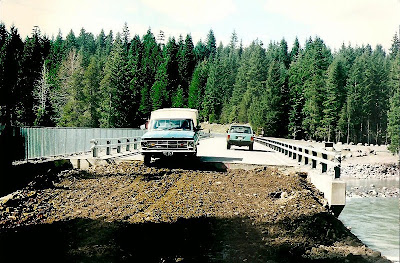 Driving on newly repaired Lewis River Road bridge Gifford Pinchot National Forest Washington