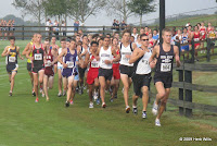#504 Tyler Davidson leads late in the first kilometer of the boys' 2A race. #444 Colin Barker can be seen running more patiently.