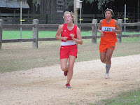 Rosalie White and Kair'Shay Jackson battle for the lead with less than 800m left in the race.