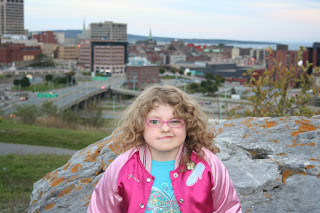 Kennedy - the Super Grammar girl, high above her beloved city of Saint John