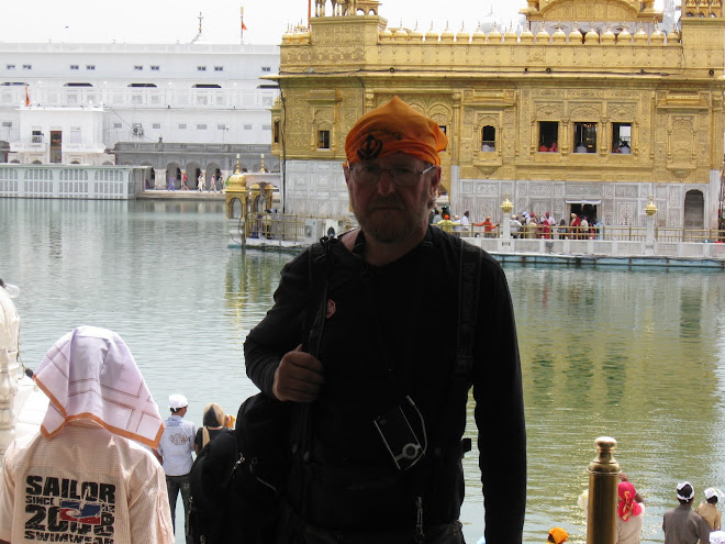 Heads covered , we visit the Golden Temple in Amritsar.