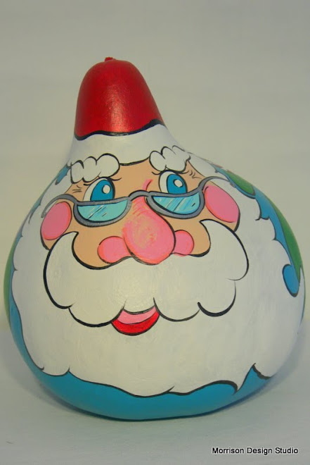 Santa Gourd - peeking into his toy bag over his shoulder.