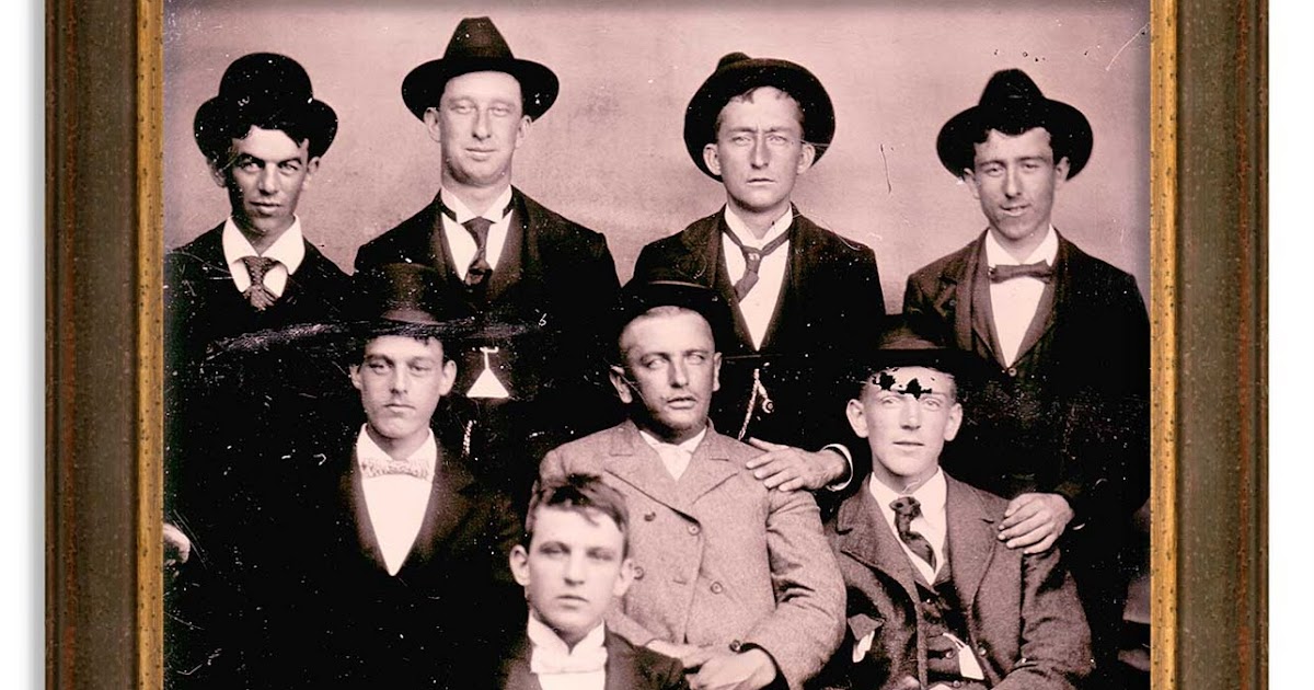Group of eight men Time travel with old photographs
