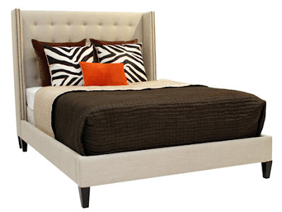 Tan upholstered bed with tall tufted headboard from Oly