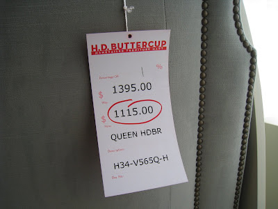 Price tag on a dusty blue suede Queen headboard from HD Buttercup