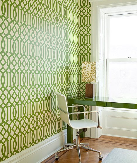 Home office with green and white Kell Wearstler Imperial Trellis wallpaper and a green Parsons desk