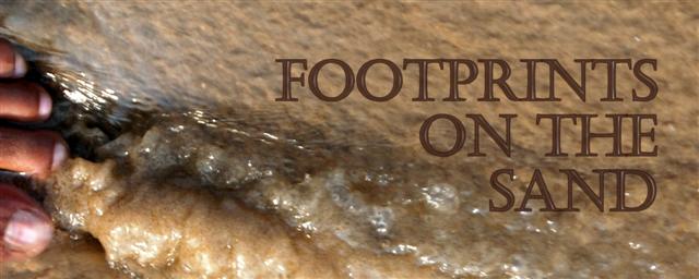 Footprints on the sand.