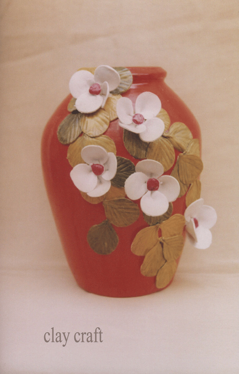 clay flowers and figurines bread craft on pot