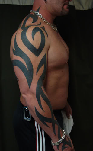 tattoos tribal. Tribal Arm And Shoulder Tattoo
