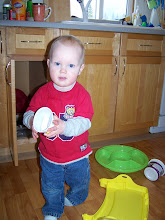 connor playing in the kitchen