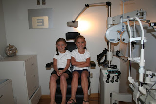 Twin girls visiting the eye doctor, before Daxton's adoption