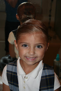 Portrait of young girl modeling "Ponytail Of Twists" hairstyle