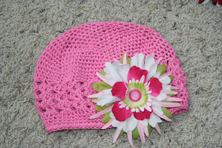 Pink hat with multi-color flower