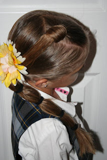 Side view of young girl modeling "Top-Knot with Banded" Ponytail