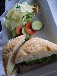 Skirt Steak Sandwich with caesar salad and fresh vegetables, The Cannery Restaurant, Port of Vancouver, BC