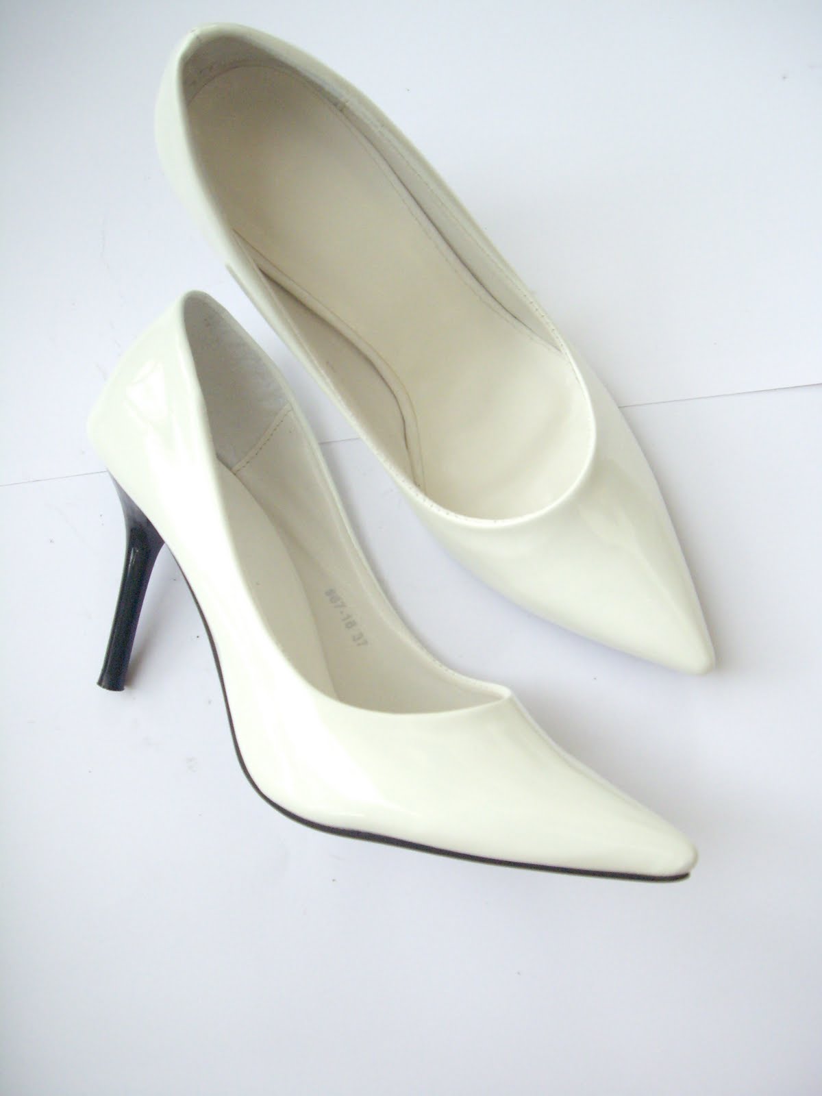 size 2 white pumps