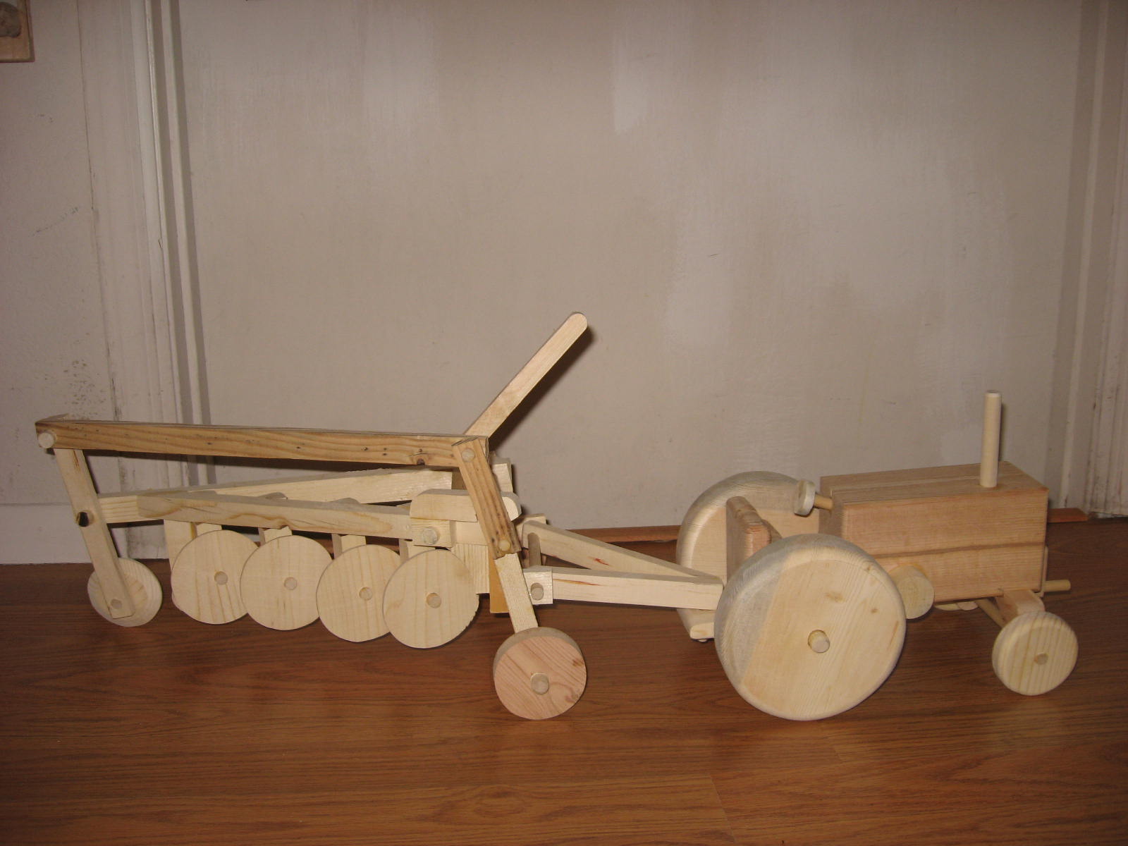 sawdustbybillyo: Four bottom plow that raises onto wheels and wide ...