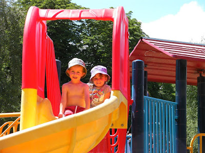 sunny day on curly plastic slide milton park portsmouth