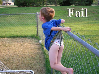 boy caught on fence wedgie