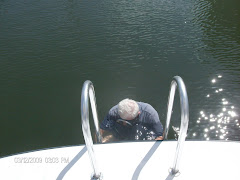 Our own 'Barnacle Fred' ready to do battle with the propeller.  Brrrr.