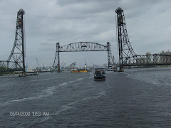 Jordan Lift Bridge has been removed from Norfolk Harbor.   See the tug pushing a barge toward us.