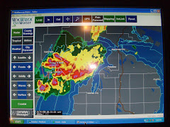 YA's weather map. Red is thunderstormL  We are located at the reflection of the flash