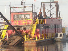 This dredge moved aside so we could leave Eastern Shore Marina. Gotta keep the channel deep!