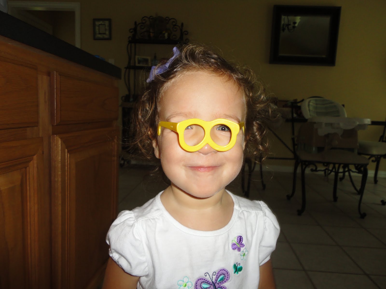 zamora trips: Elli with Mr. Potato Head glasses on